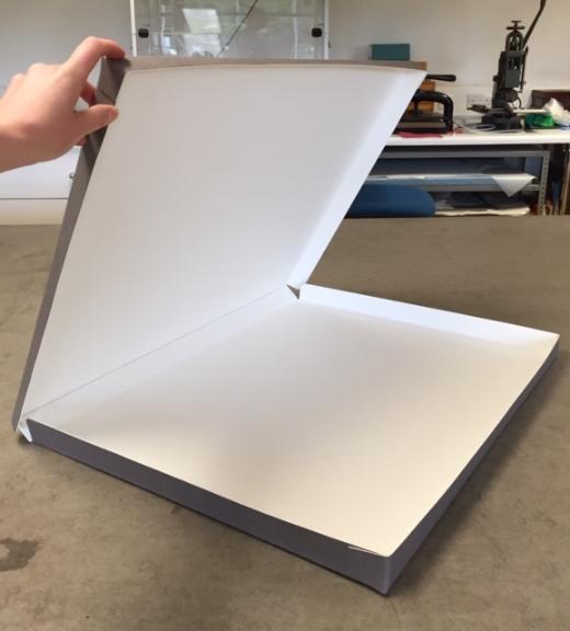 Large clam-style box for over-size volume